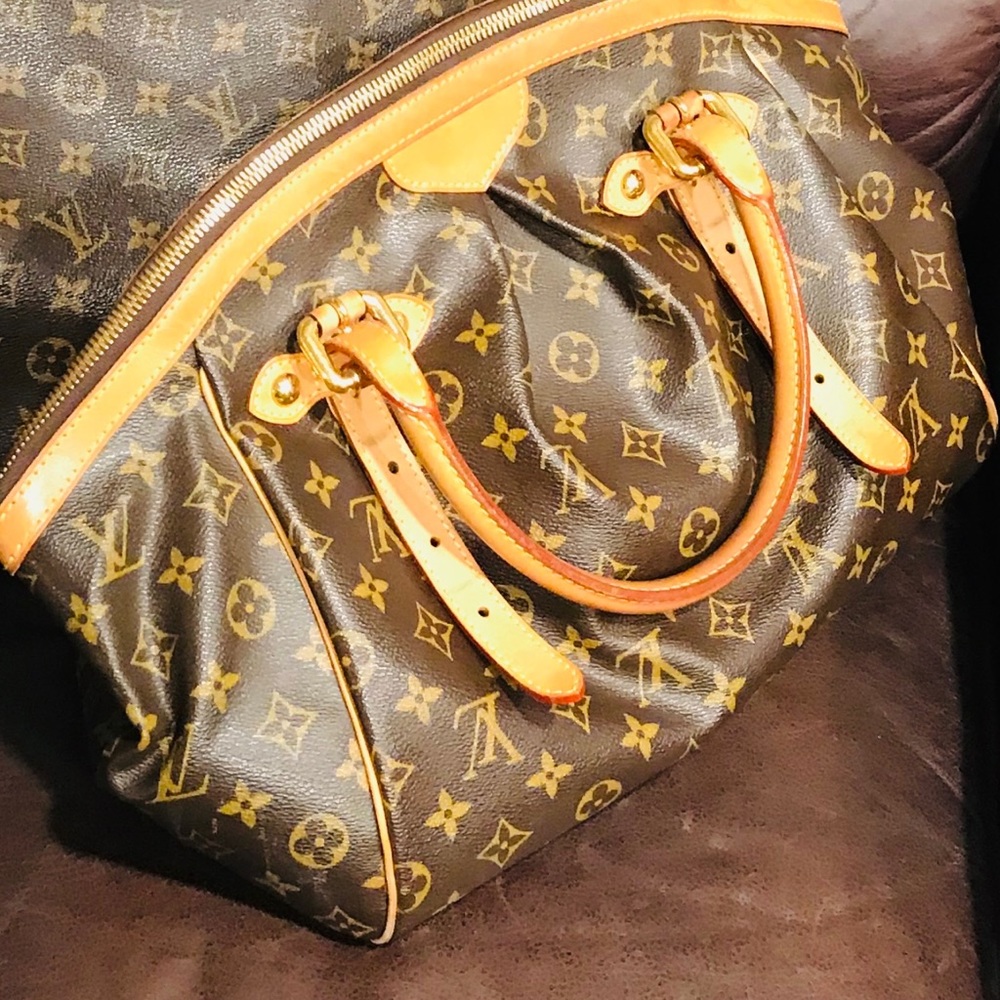 Louis Vuitton.   Tivoli GM Monogram Handbag
Handbag Brown